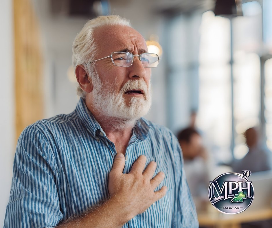 Patient discussing shortness of breath with a doctor during a heart and lung assessment