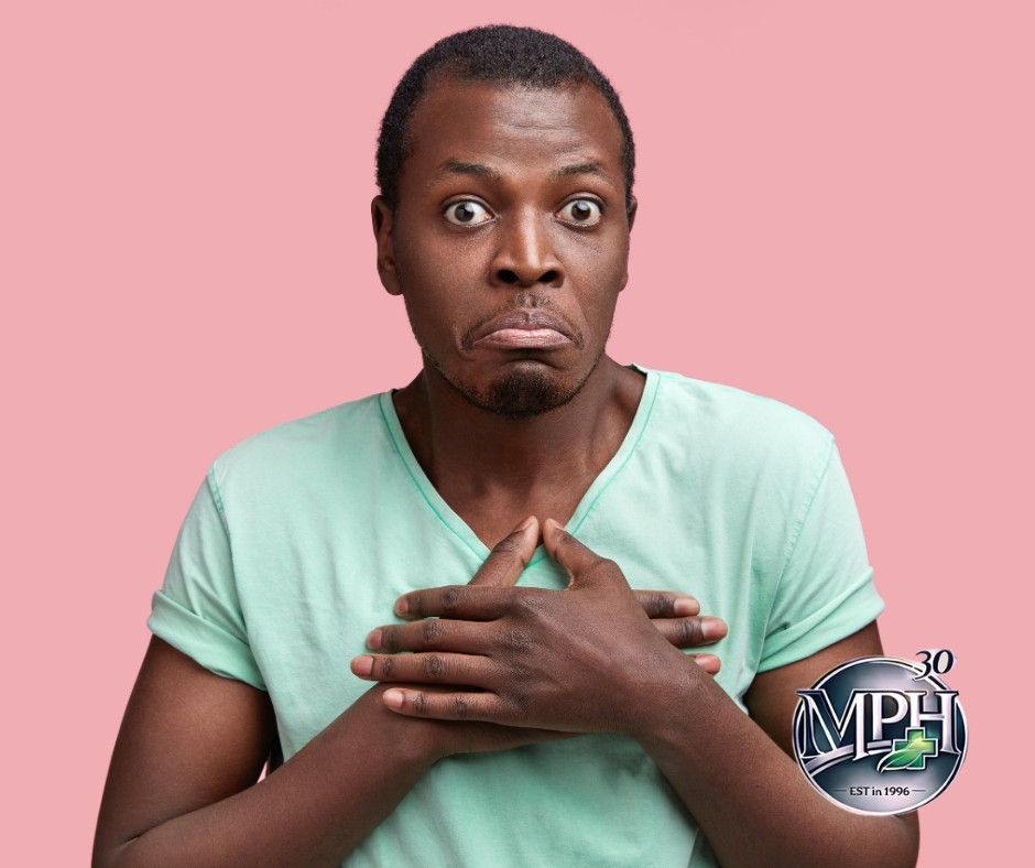Patient discussing shortness of breath with a doctor during a heart and lung assessment