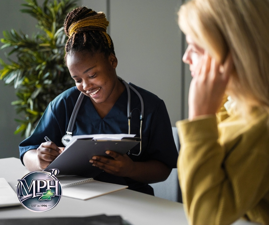 Patient discussing shortness of breath with a doctor during a heart and lung assessment
